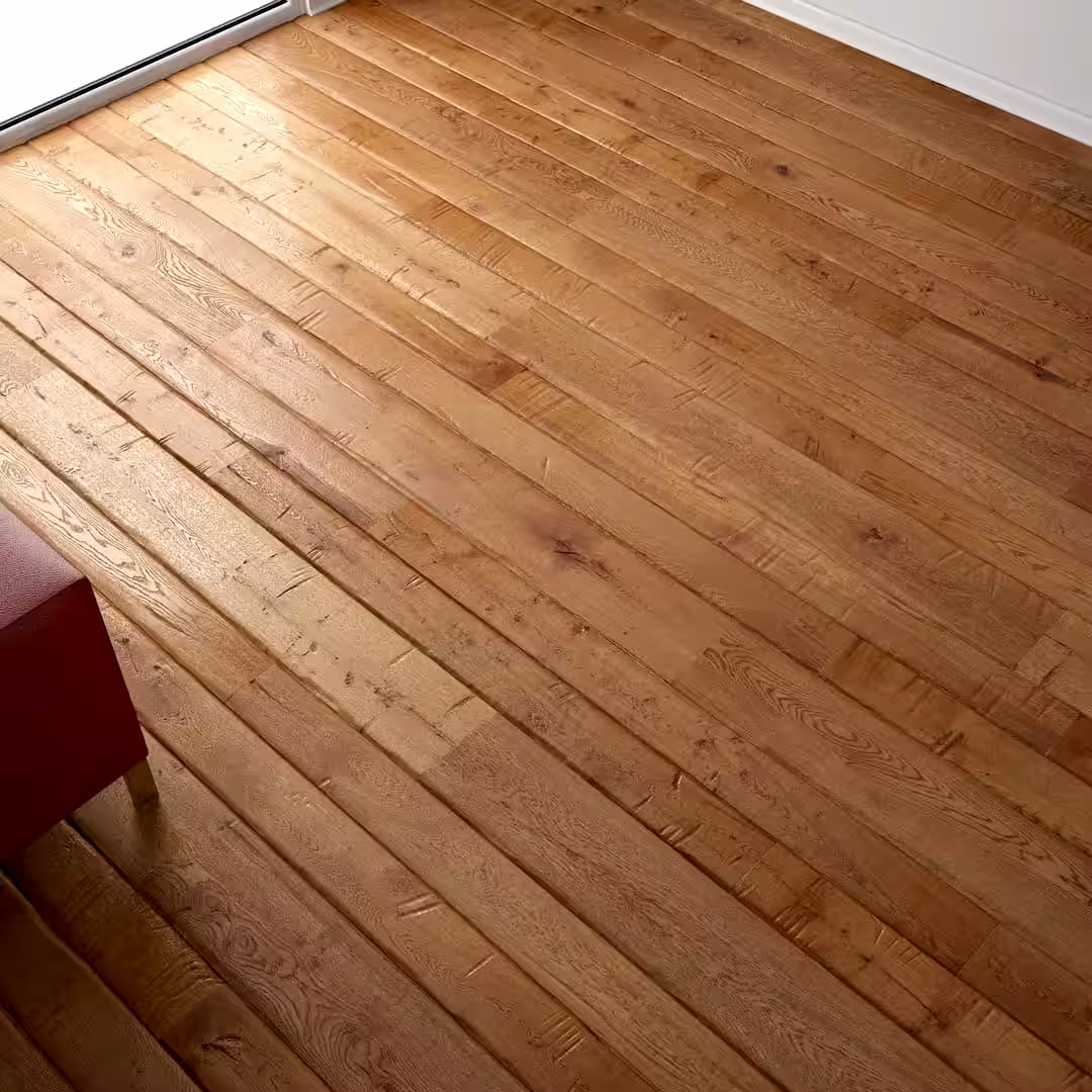 Egy parkettázó szalagparketta lerakása közben Hajdúsámsonban